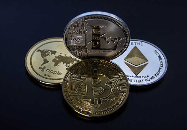 Erpressertrojaner: Vier verschiedene Kryptomünzen. Bild: Pexels/@worldspectrum